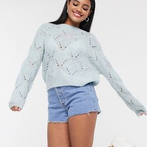Light blue sweater